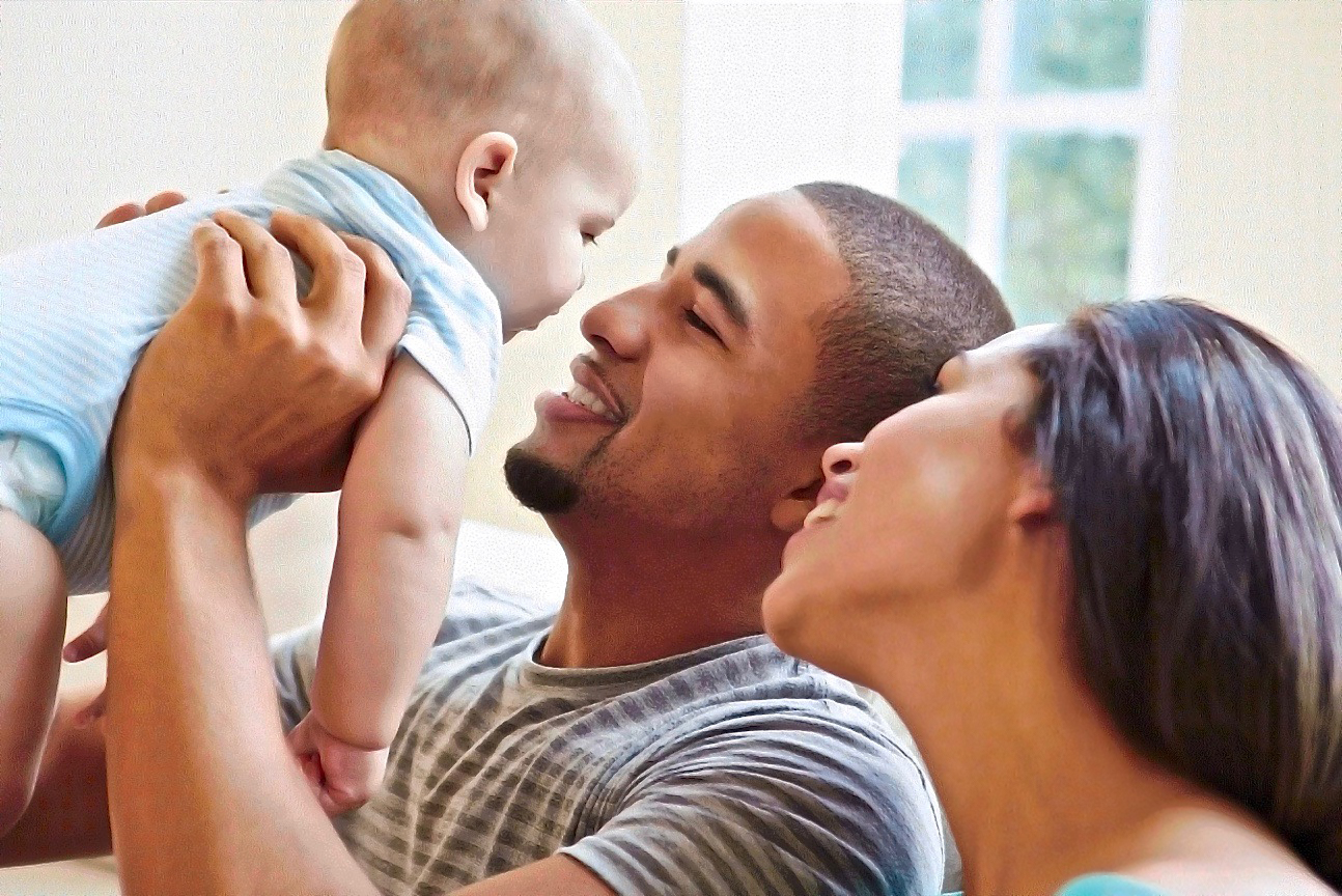 Man, woman, and baby at child care