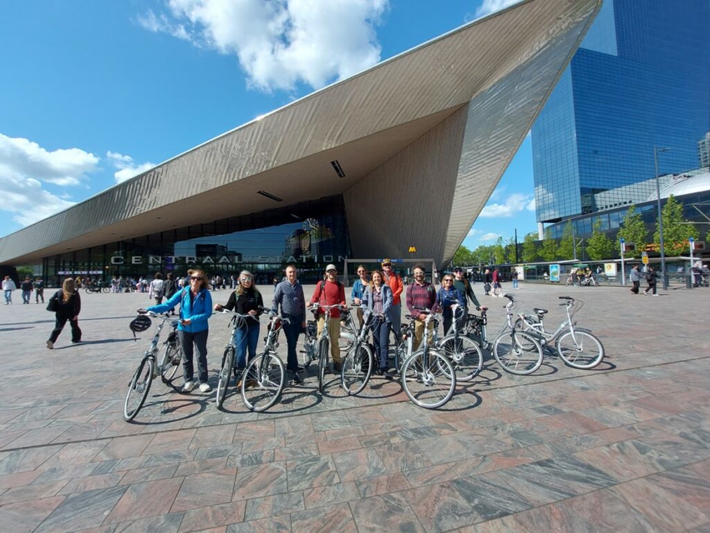 Photo of a group of people with bicycles in the Netherlands.