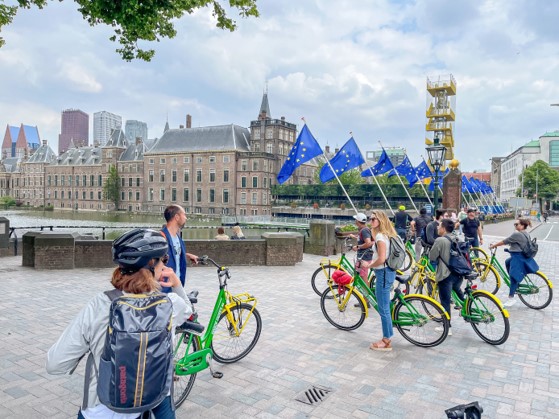 Photo of a group of people with bicycles in the Netherlands.