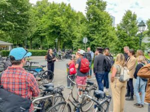 Photo of a group of people listening to a tour guide in the Netherlands.