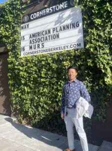 Photo of young man in front of an establishment in Berkeley, Califonria
