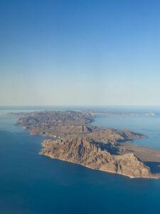 Aerial view photograph of the arid mountainous Loreto Bay region of Baja California Sur.