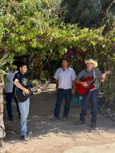 Three Latino Ranchers serenading visitors to Rancho Viejo of Santa Cruz.