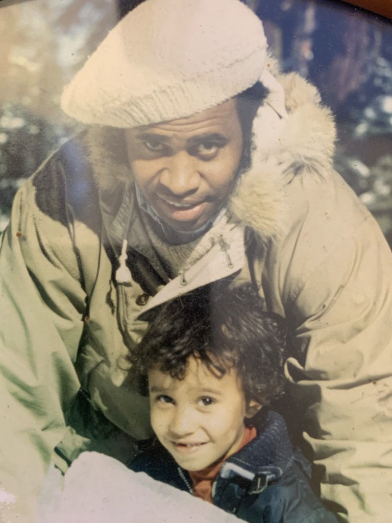 Carl Anthony_Page_2_Image_0001 Photograph of Carl Anthony with his young son, Khalil, both smiling for the camera.